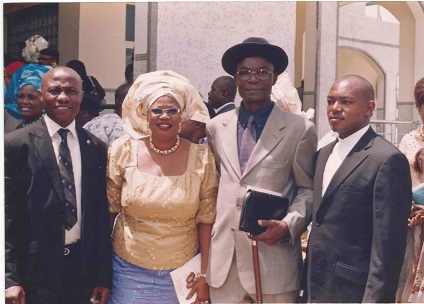 Aloy, Mummy, Daddy and Rev. Fr. Nonso