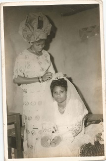 Rose helping Anthonia get ready for her wedding