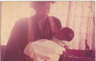 Mummy with baby Oby during her graduation from F.C.E. Tech in 1986