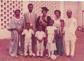 Rose poses with family & friends after graduation from F.C.E. (Tech) Akoka